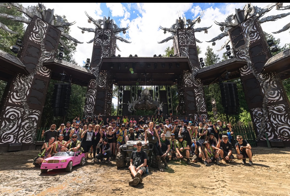 The Village crew in front of the stage gate in Salmo, BC